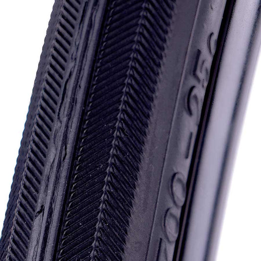 Evo Dekko road tire with black rubber tread and sidewalls, designed for performance and durability on paved surfaces.