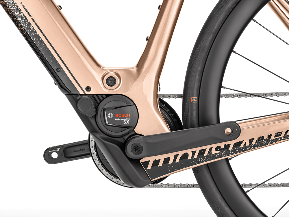 Close-up of the motor detail on the Moustache Dimanche 28 Road 6 electric bicycle, showcasing the bike's electric motor and sleek design.