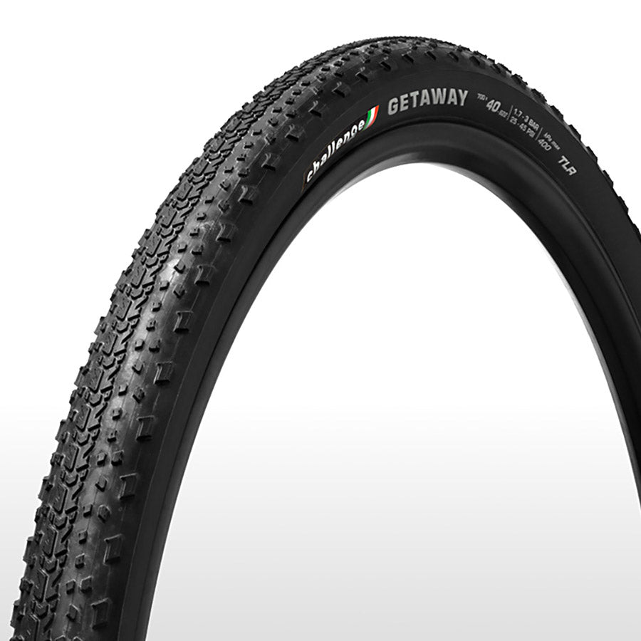 Challenge Getaway Race V-TLR gravel tires with tanwall sidewalls, designed for durability and performance on mixed terrain.