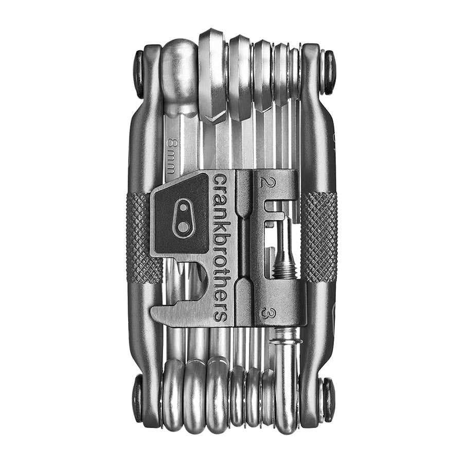 Crankbrothers Multi 19 multi-tool in black and red, featuring various screwdrivers, hex wrenches, and other bike repair tools.