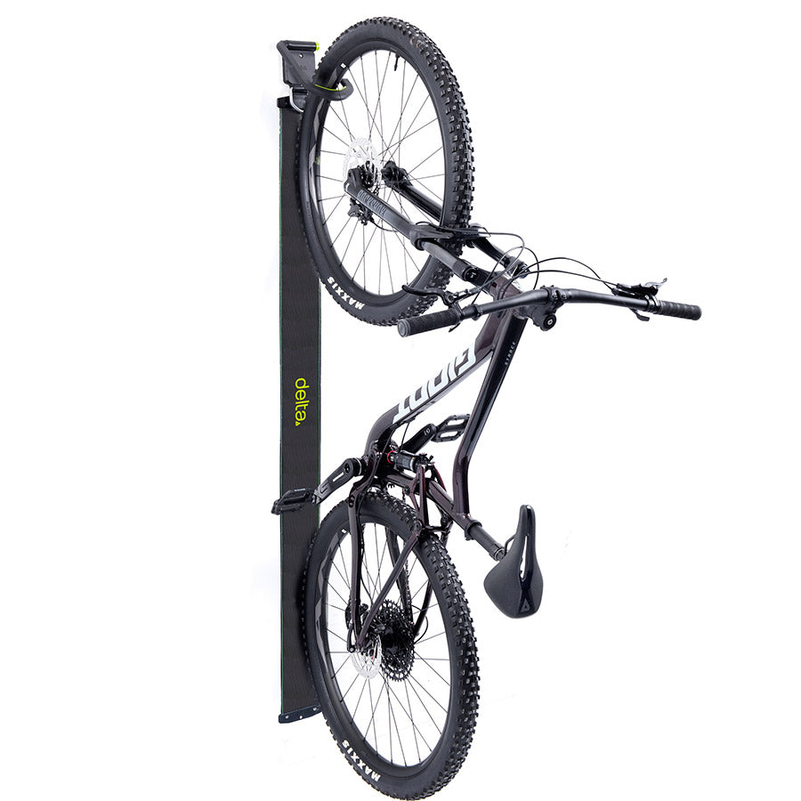 Delta Wall Ride bicycle hooks for tires up to 3.75 inches, holds up to 100lbs, mounted on wall for bike storage.