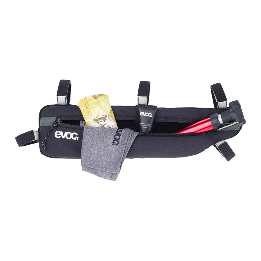 EVOC Frame Pack frame bag attached to a bicycle frame, featuring durable material and multiple compartments for storage.