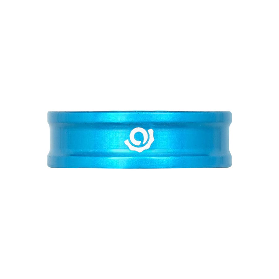 Set of three turquoise aluminum Industry Nine iRiX headset spacers, 5mm for bike headset installation.