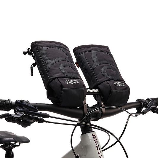 Pair of black Kids Ride Shotgun Pogies for baby seat accessories, providing warmth and protection for young riders.