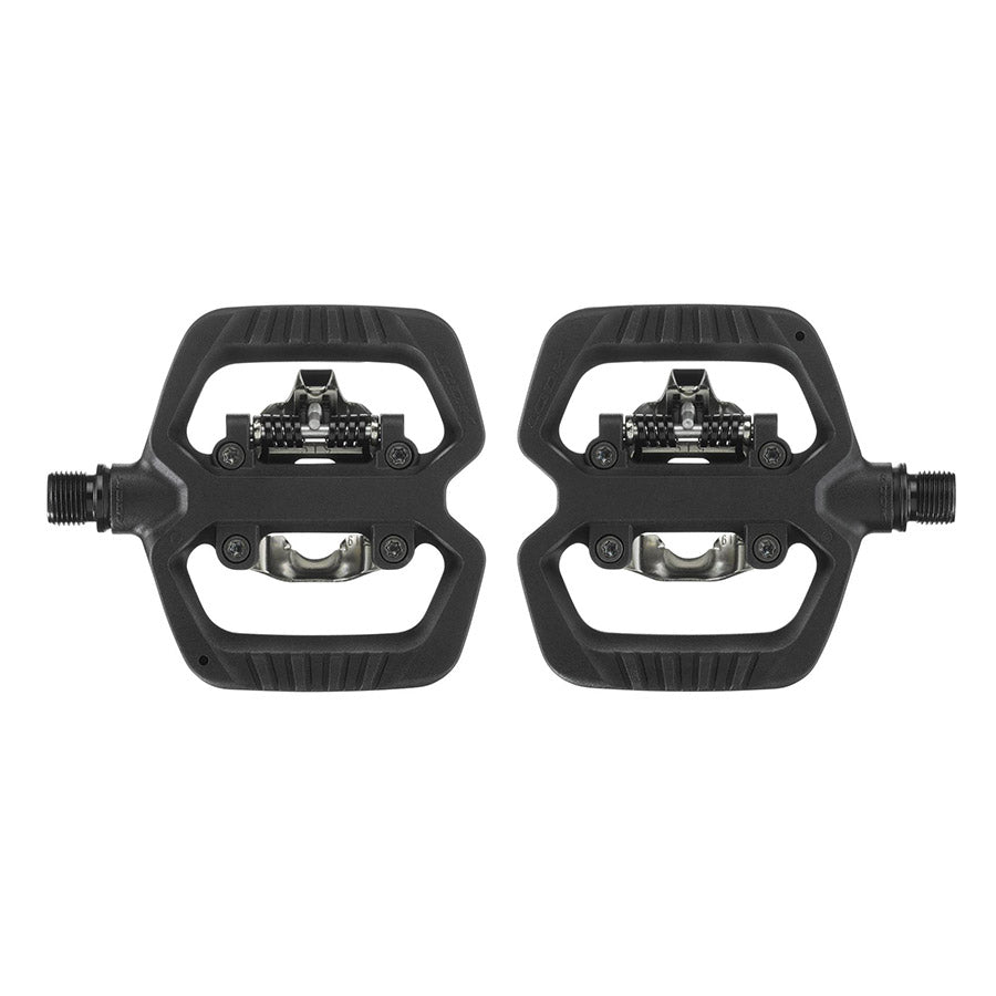 Look X-Venture clipless road pedals with black composite body and Cr-Mo spindle, designed for secure cycling performance.