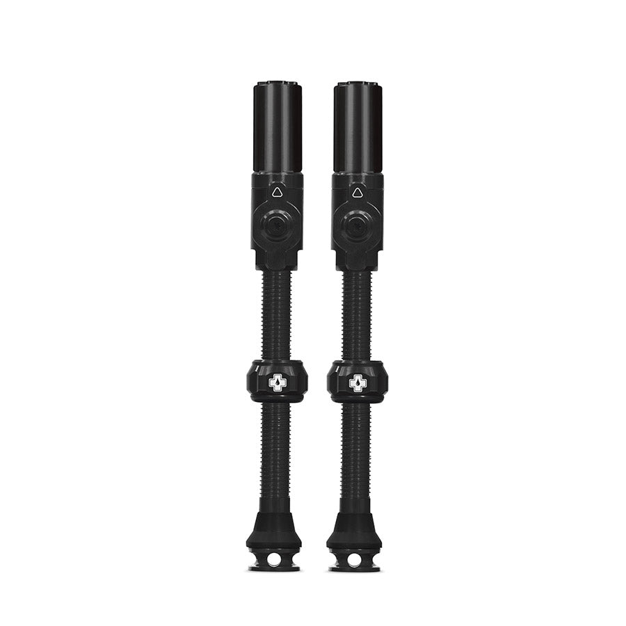 Pair of Muc-Off Big Bore Hybrid Small tubeless valve stems in black, 30mm length for bike wheels.