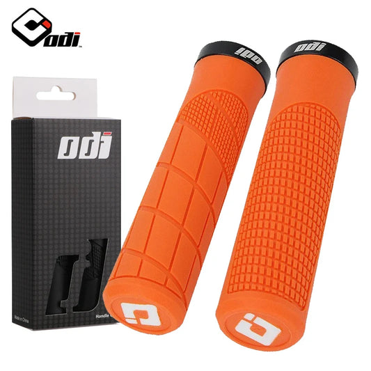 Black ODI Clamp On Rubber Grips for bikes, showing textured rubber surface and secure clamp mechanism.