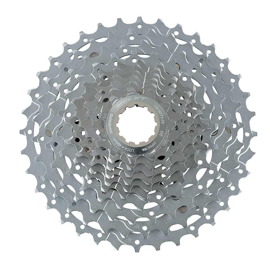 Shimano XT CS-M771-10 11-32T cassette with 11, 12, 14, 16, 18, 20, 22, 25, 28, 32T gears for mountain biking.