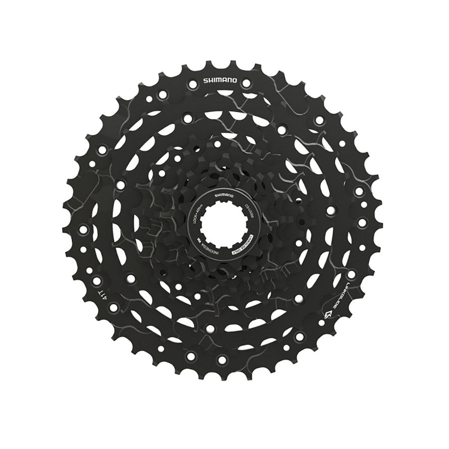 Shimano CS-LG300-9 cassette with 11-36T gear range, shown in close-up with shiny metal teeth and black body on a white background.