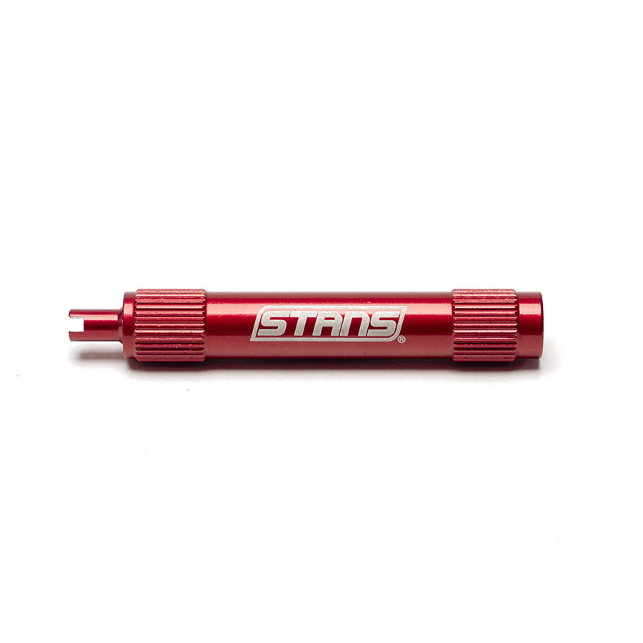 Stans No Tubes valve core tool for tubeless bike tires, compact and durable tubeless accessories tool in black.