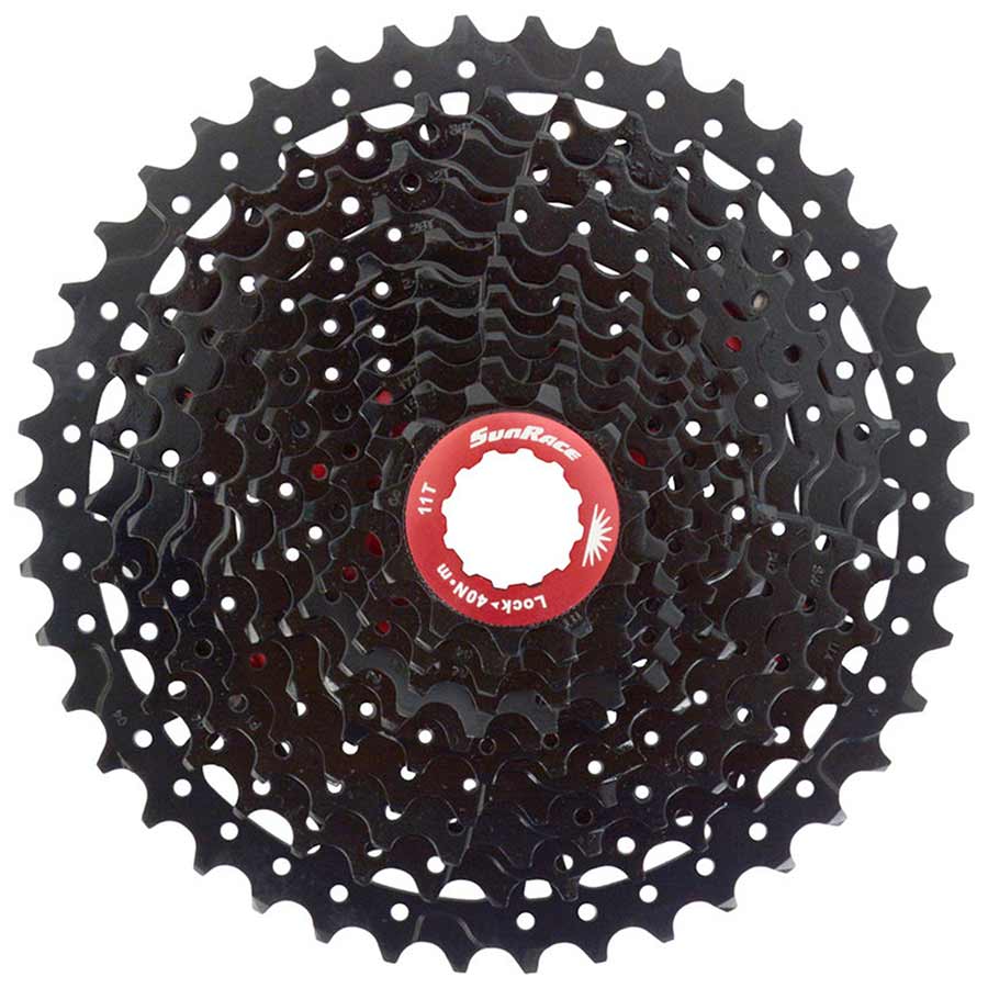 Sunrace CSMX8 cassette with 11-46T gear range, shown in close-up, featuring durable black metal construction for mountain biking.