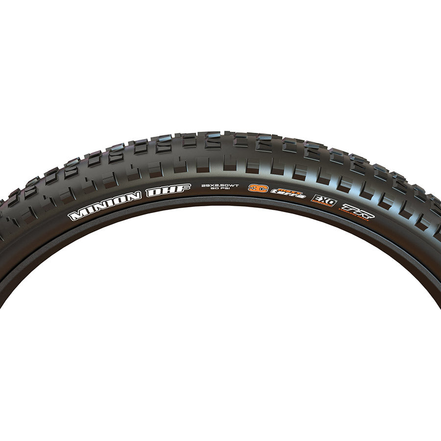 Maxxis Minion DHF mountain bike tire with knobby tread pattern, designed for aggressive trail riding and enhanced grip.