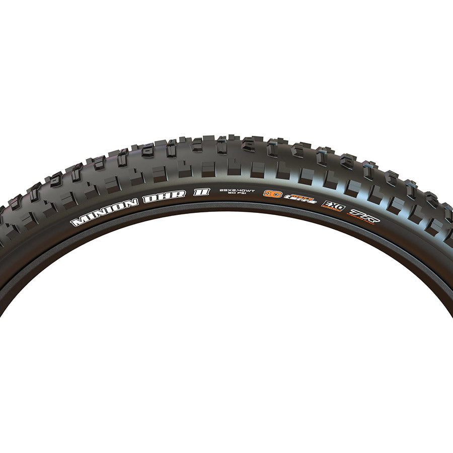 Maxxis Minion DHR2 mountain bike tire with rugged tread pattern for off-road riding and enhanced traction.