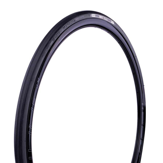 Evo Dekko road tire with black rubber and tread pattern, designed for cycling on paved surfaces.