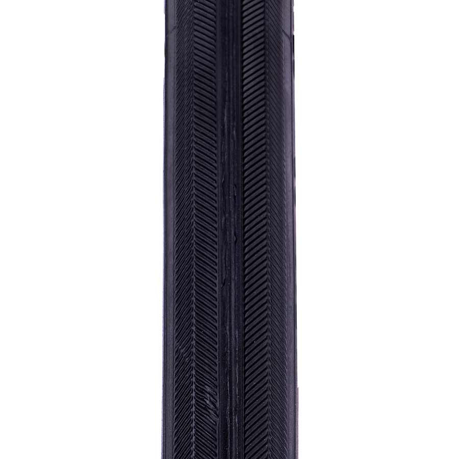 Evo Dekko road tires with textured black rubber and sidewall branding, suitable for high-performance cycling on paved surfaces.
