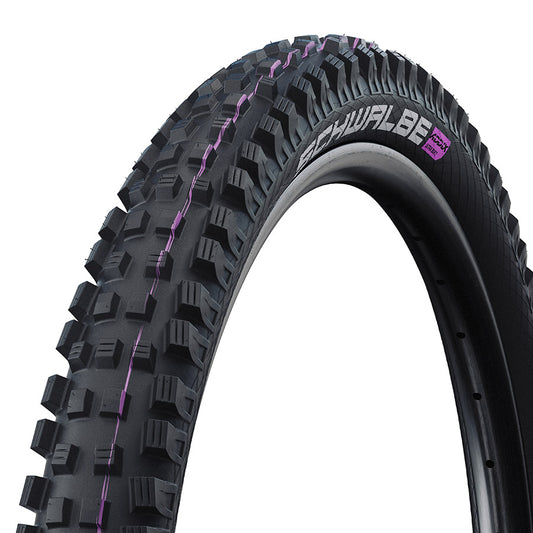 Schwalbe Magic Mary Trail Pro mountain tire with aggressive tread pattern for off-road cycling, mounted on a wheel.