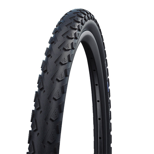 Schwalbe Land Cruiser hybrid tires mounted on a vehicle, showcasing durable tread design for off-road and on-road use.