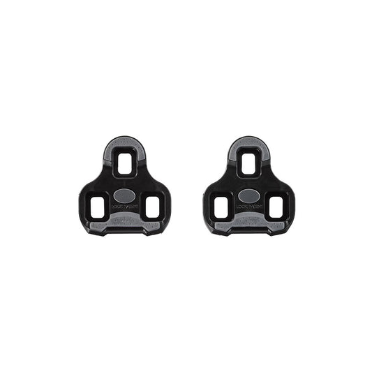 Look Keo Grip 0° black cycling cleats shown on a pedal, featuring a sleek black design and secure attachment for competitive cycling.