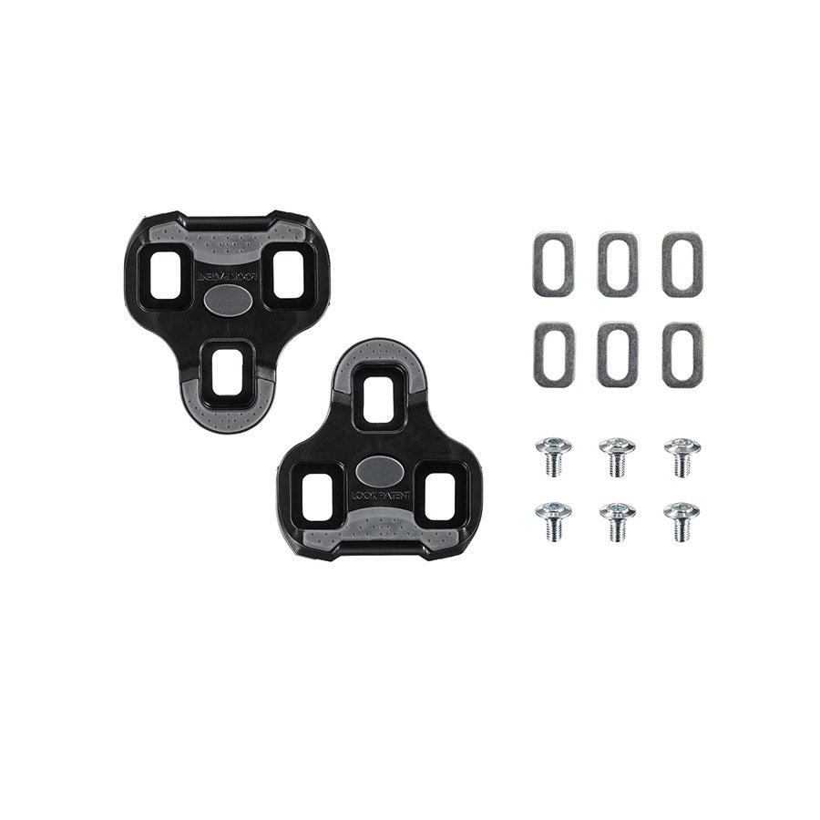 Look Keo Grip 0° black cycling cleats attached to a bike pedal, showcasing durable and adjustable design for road cycling.