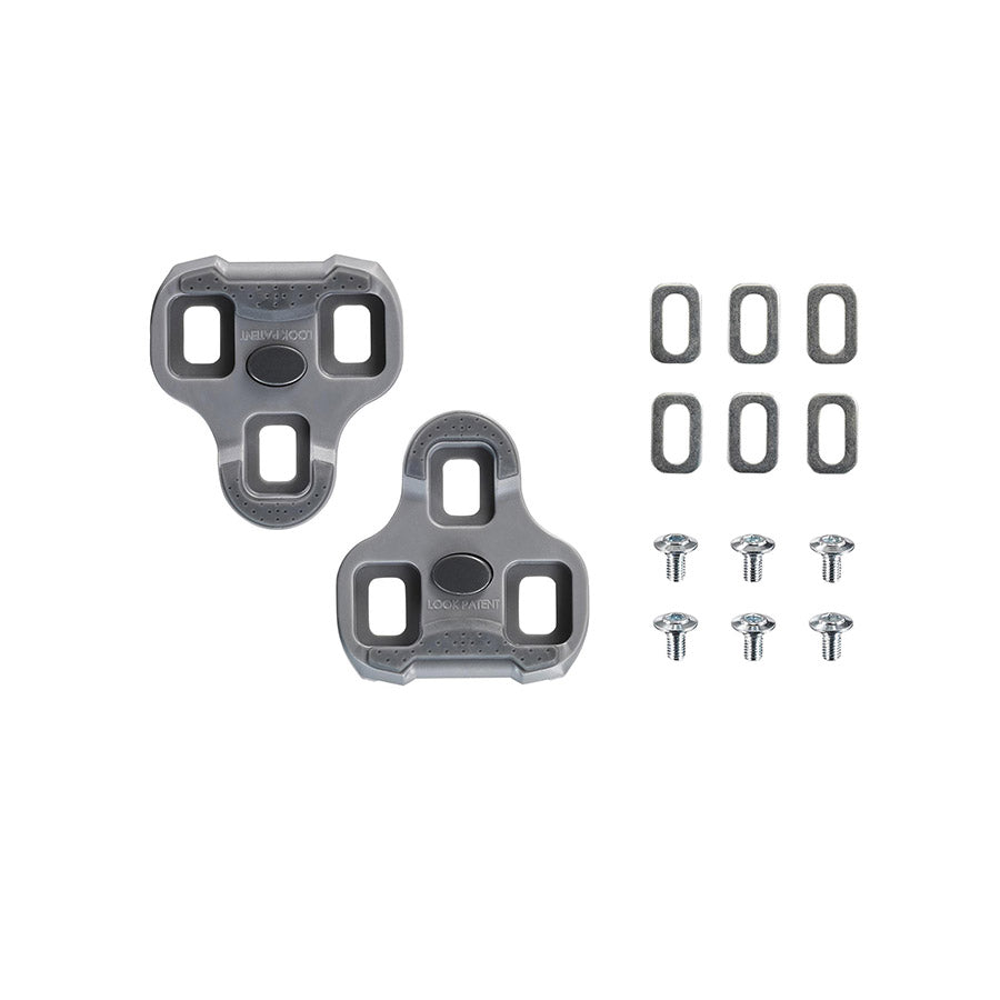 Look Keo Grip 4.5° grey cleats mounted on cycling shoes, close-up view showing the textured surface and branding.