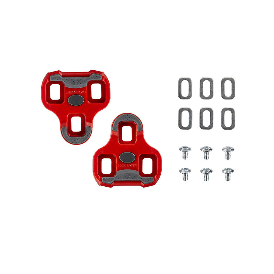 Look Keo Grip 9° red bike cleats with textured surface and mounting hardware for road cycling shoes.