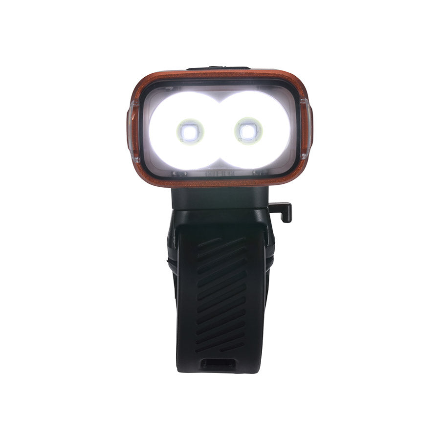BBB Cycling BLS-263i Nanostrike 1000i bike light mounted on a bicycle handlebar with bright LED illumination.
