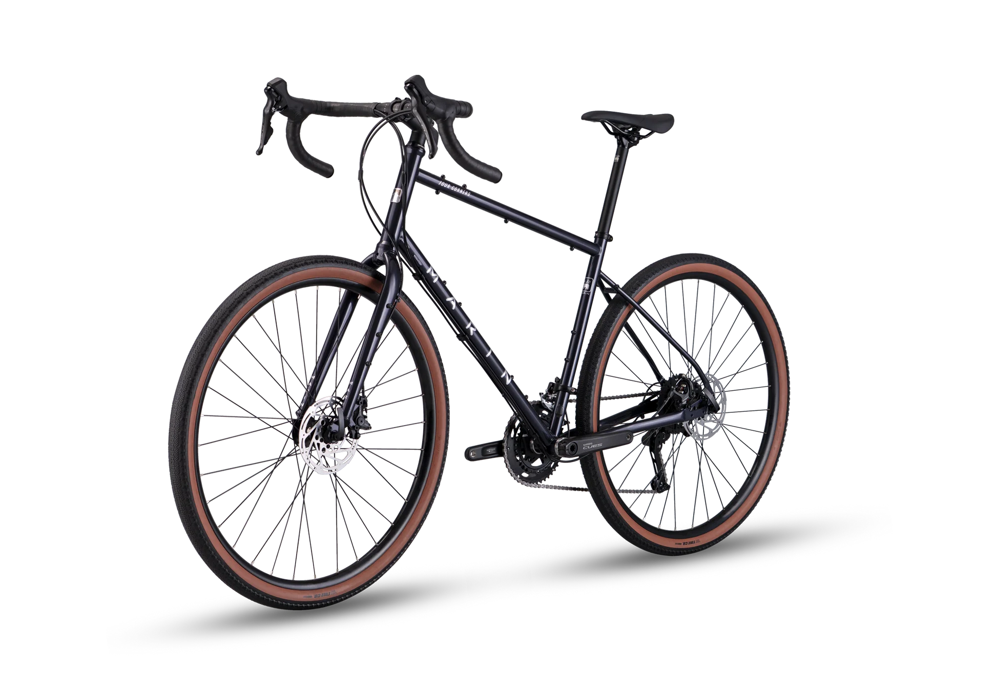 Marin Four Corners 1 gravel bike with purple frame and rear view, featuring drop handlebars and rugged tires for off-road riding.