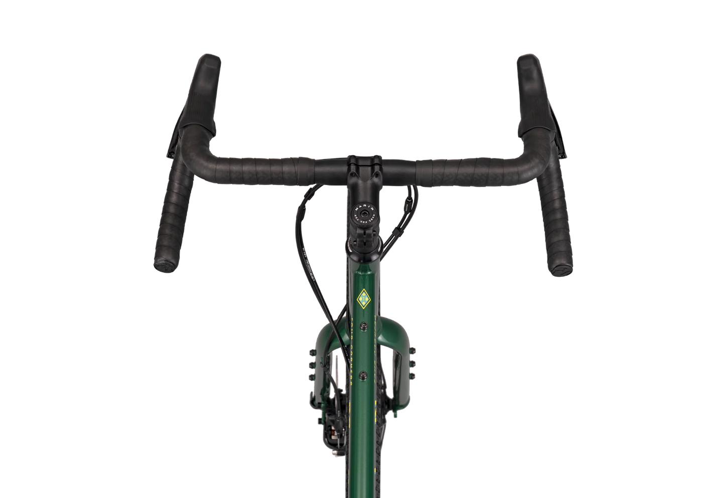 Marin Four Corners 1 gravel bike cues in green, featuring a sturdy frame and off-road tires suitable for gravel cycling adventures.