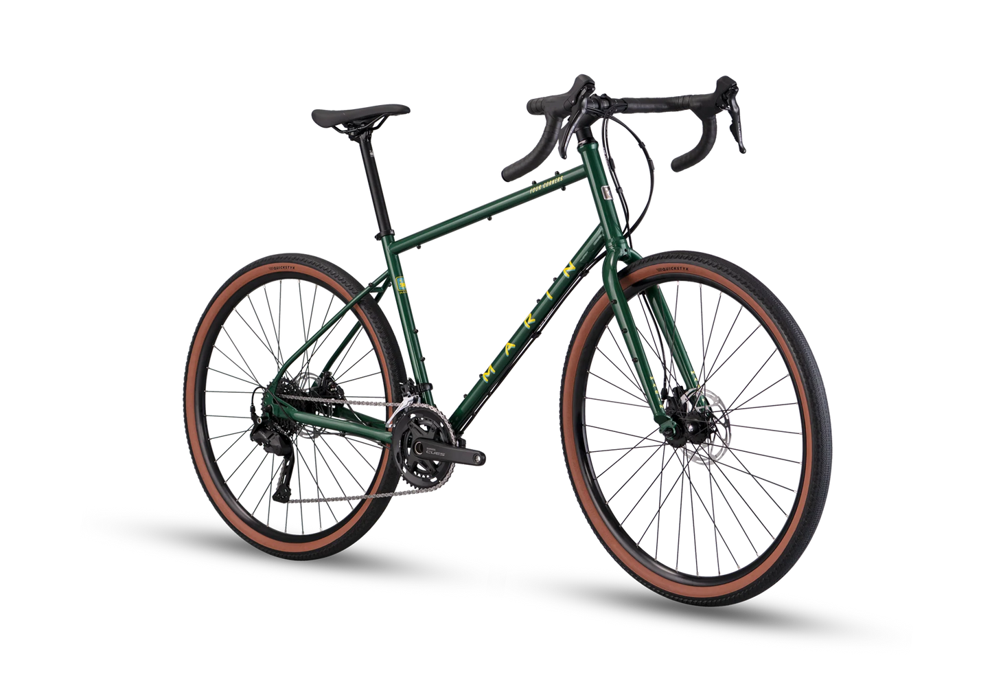 Green Marin Four Corners 1 gravel bike with front view, featuring sturdy frame and knobby tires, designed for versatile gravel riding.