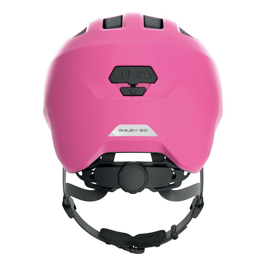 Pink Abus Smiley 3.0 youth helmet with butterfly design, featuring adjustable straps and ventilation for kids' safety.