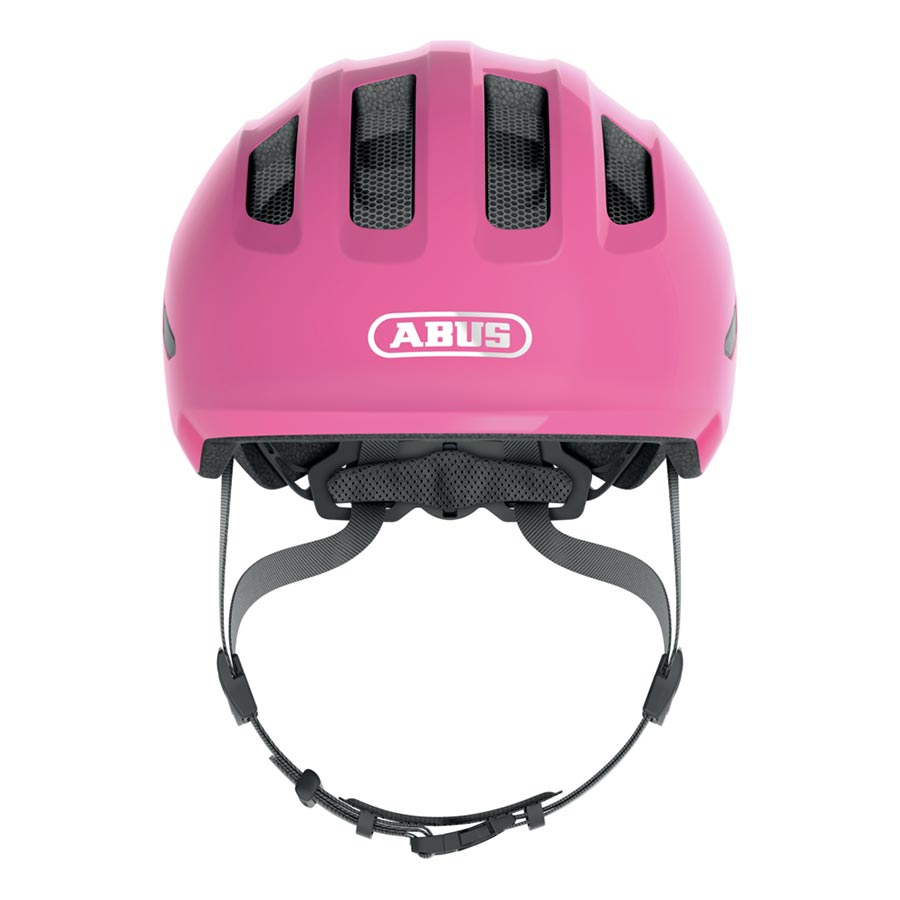 Pink Abus Smiley 3.0 youth helmet with butterfly design, safety straps, and ventilation for kids' biking safety.