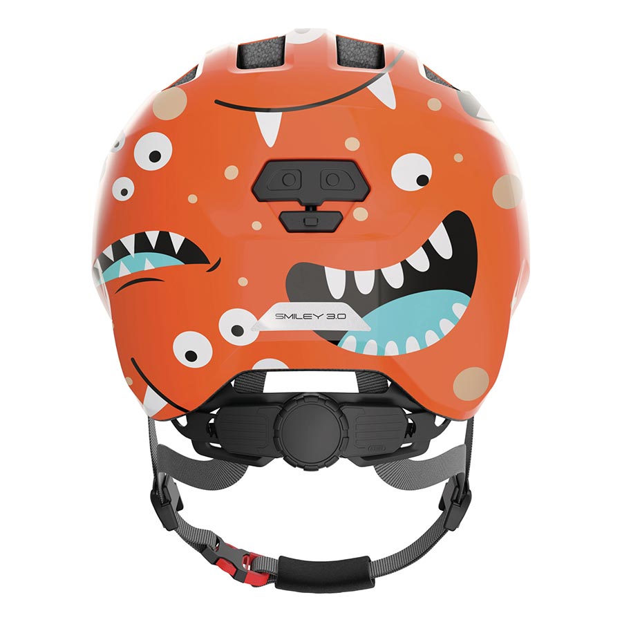 Pink Abus Smiley 3.0 youth helmet with butterfly design, lightweight helmet for children, featuring adjustable straps and ventilation.
