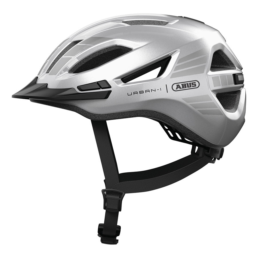 Abus Urban-I 4.0 LR recreational and commuter helmet in signal silver, showcasing adjustable straps and ventilation for urban cycling.