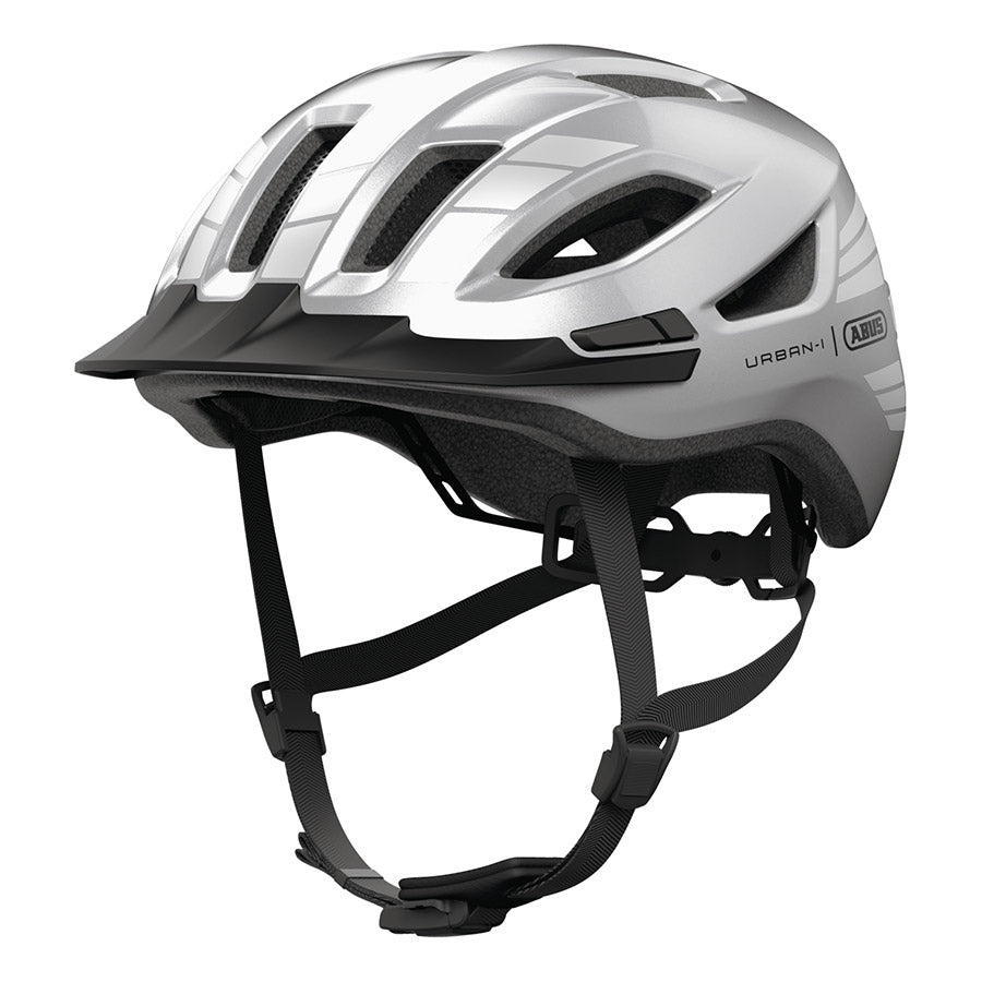 Abus Urban-I 4.0 LR recreational and commuter helmet in silver, shown with adjustable straps and ventilation vents.