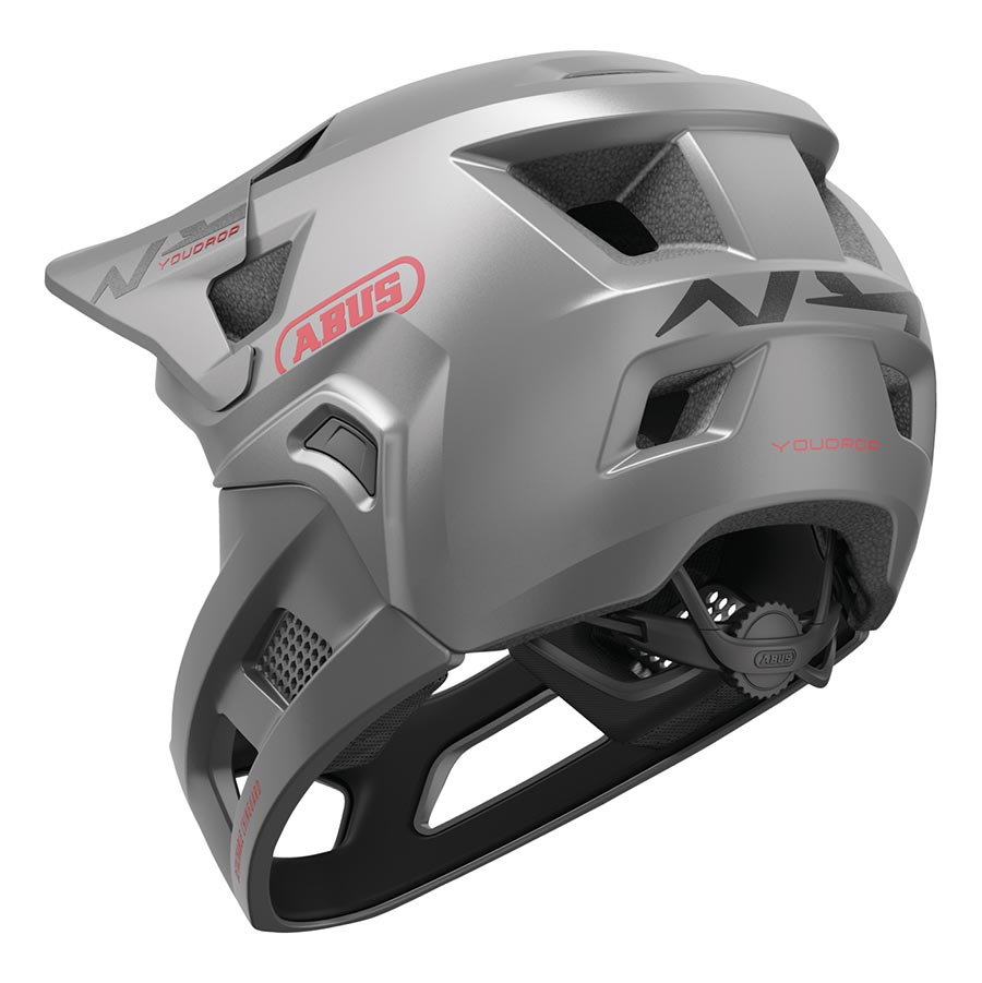 Abus YouDrop FF youth mountain helmet in velvet black with adjustable straps and ventilation for safe outdoor biking.