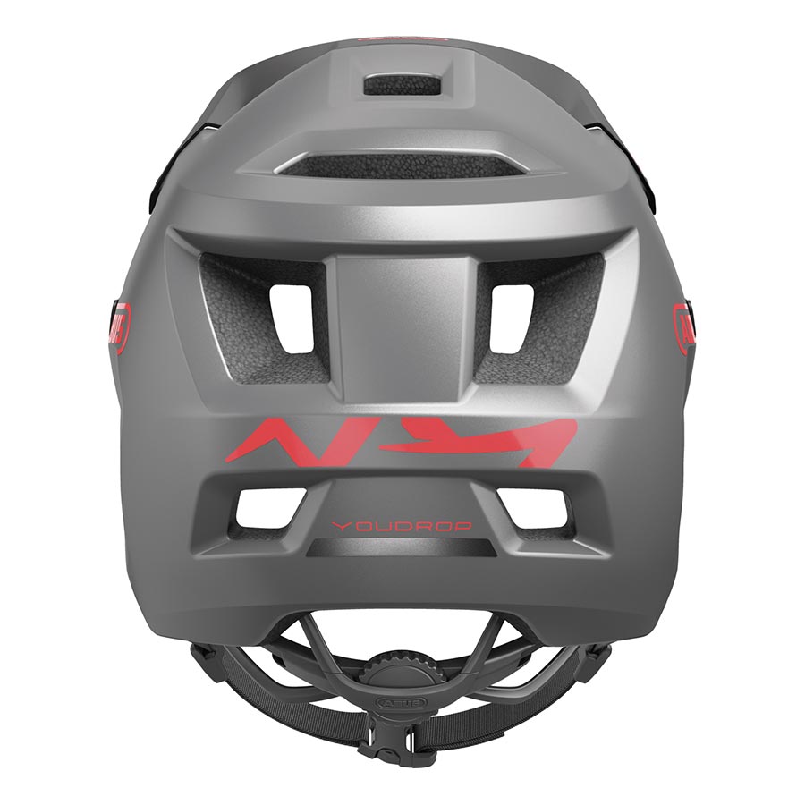Abus YouDrop youth mountain helmet in velvet black with adjustable straps and ventilation for kids' outdoor biking safety.