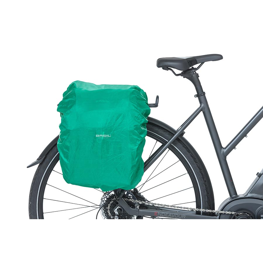 Black Basil Discovery 365 panniers with 18L capacity for bikes, featuring durable waterproof fabric and secure attachment system.