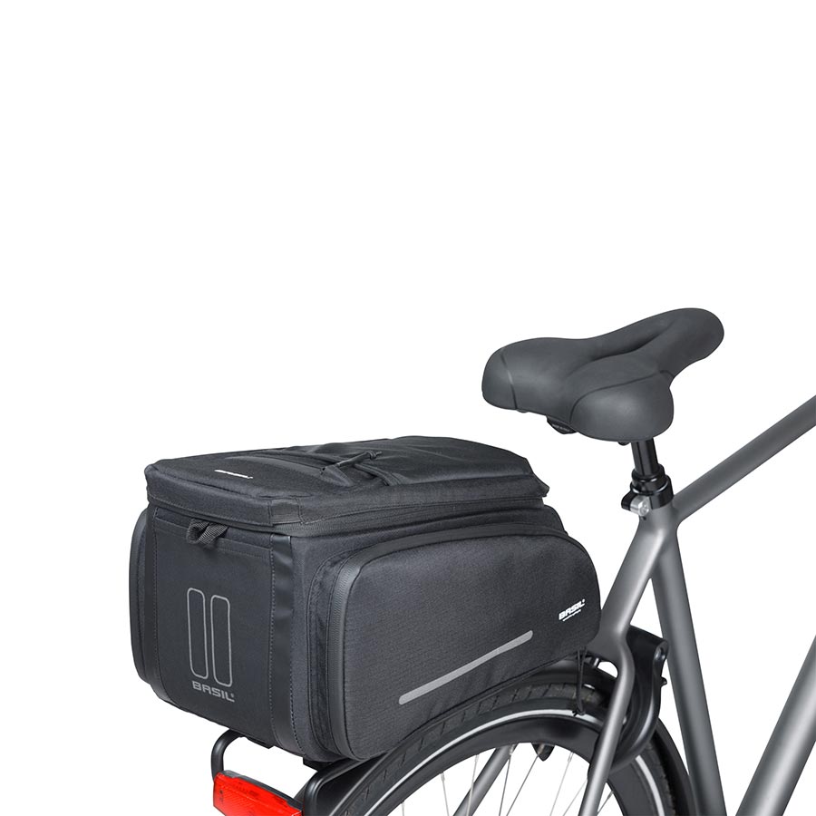 Basil Move Luggage trunk bag in black with 10-26L capacity, durable outdoor fabric, designed for motorcycle trunk storage.