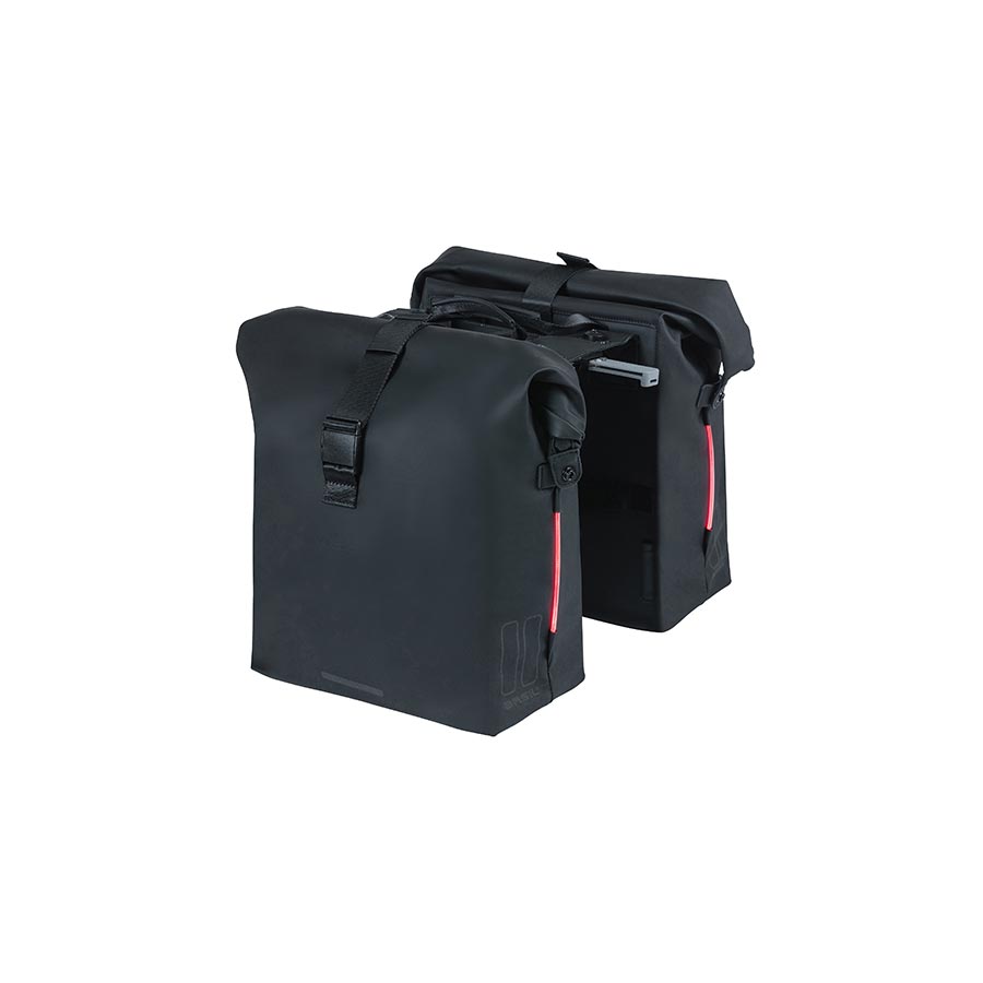 Black Basil SoHo panniers mounted on a bicycle, 42L capacity, durable waterproof fabric, ideal for commuting and bike touring.