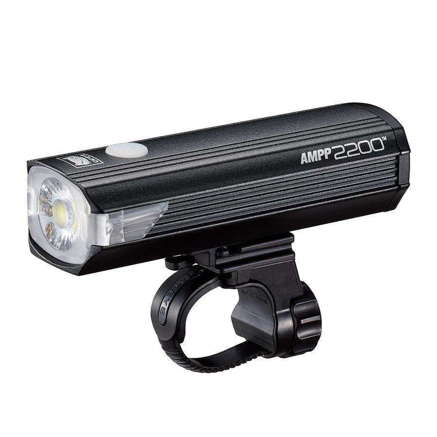 CatEye AMPP2200 bike light showing its compact design and bright LED illumination for enhanced visibility during night rides.