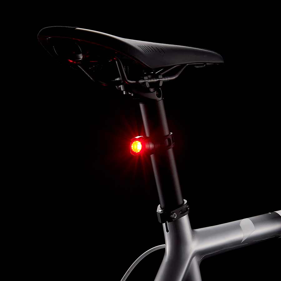 Black CatEye Orb Rechargeable rear bike light with bright LED illumination and compact design.