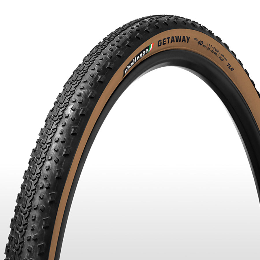 Challenge Getaway Race V-TLR gravel tires with tanwall sidewalls, designed for durable off-road cycling performance.