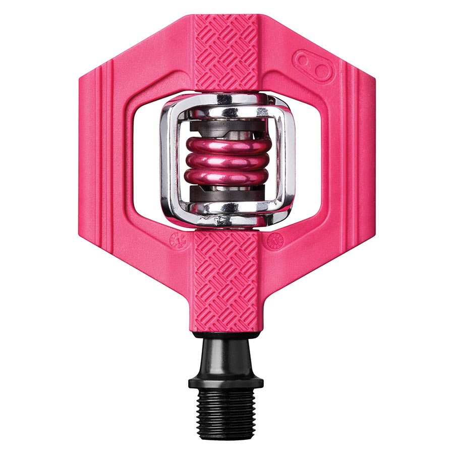 Crankbrothers Candy 1 clipless MTB pedals in black, shown as a pair mounted on a bike crankset with pedal cleats.