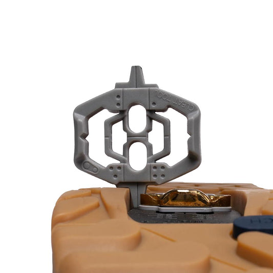 Crankbrothers cleat tool for bike cleats, grey color, compact and portable for easy cleat adjustments.