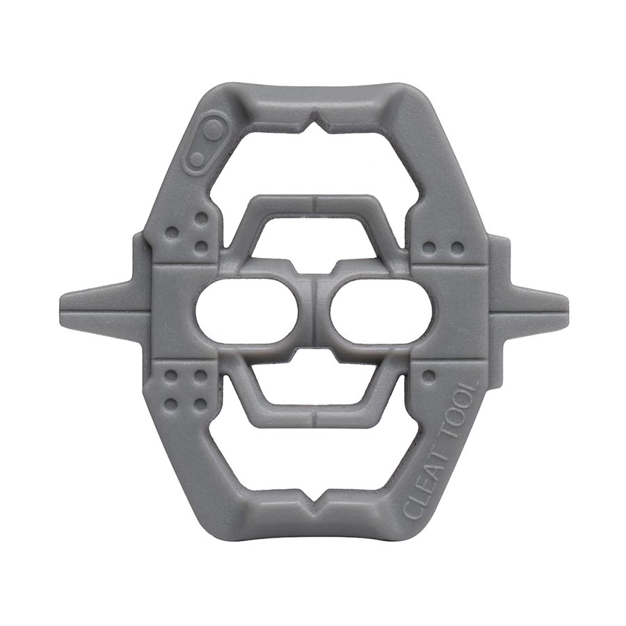 Crankbrothers cleat tool for bike cleats, grey color, compact and ergonomic for easy installation and adjustment.