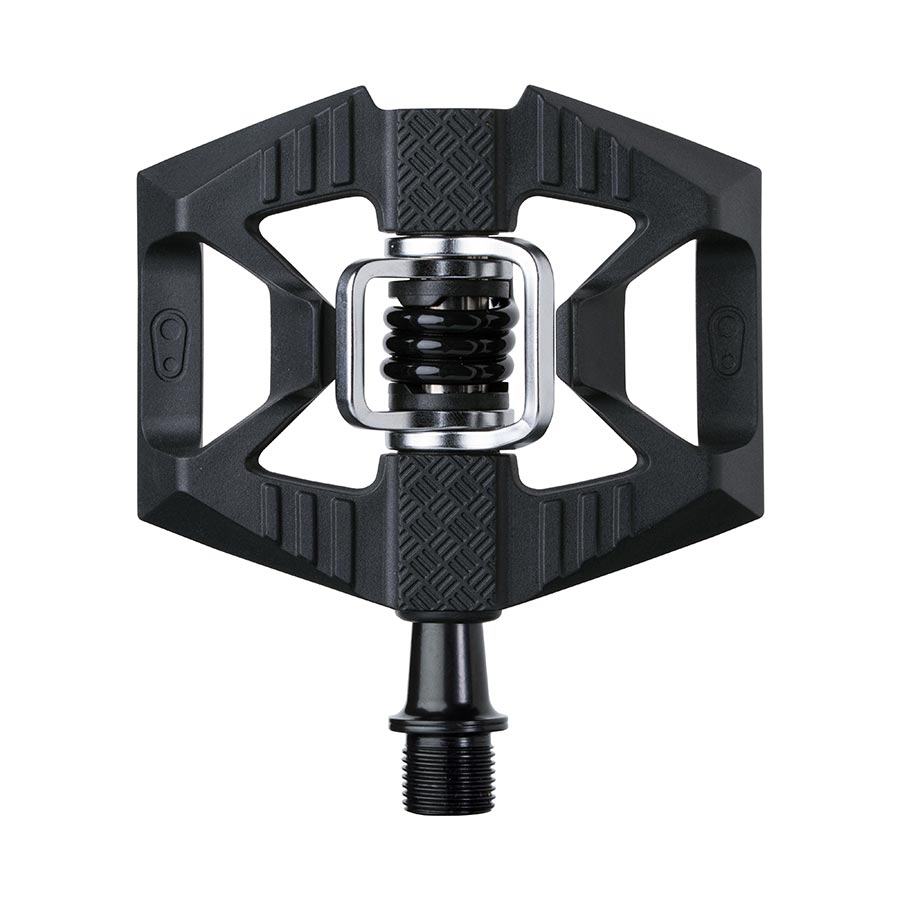 Crankbrothers DOUBLESHOT 1 clipless MTB pedals in black, showing the pair with cleat compatibility and pedal body details.