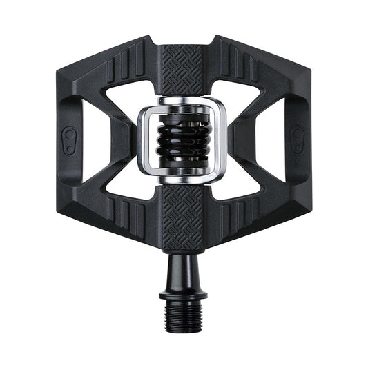 Crankbrothers DOUBLESHOT 1 clipless MTB pedals in black, showing the pair with cleat compatibility and pedal body details.
