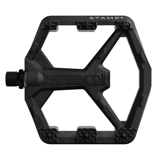 Pair of Crankbrothers Stamp 0 black platform pedals for mountain biking, showing the textured surface and sturdy design.
