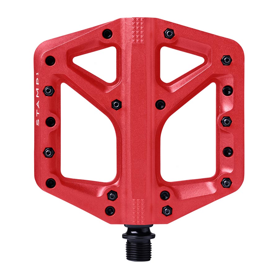 Pair of black Crankbrothers Stamp 1 platform pedals for mountain biking with large, durable design and textured surface for grip.