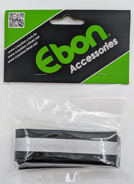 Ebon Accessories Ebon Pant-tie safety item with black fabric and adjustable strap, designed for secure fastening and safety purposes.
